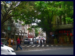 Guangzhou Qiyi Lu (Guangzhou Qiyi Road) is a narrow, winding, road with small stores, markets, shoe stands and buildings in typical Chinese style.
It is very crowded and a bit chaotic, but it is worth to visit since it gives a taste of "the real China". .